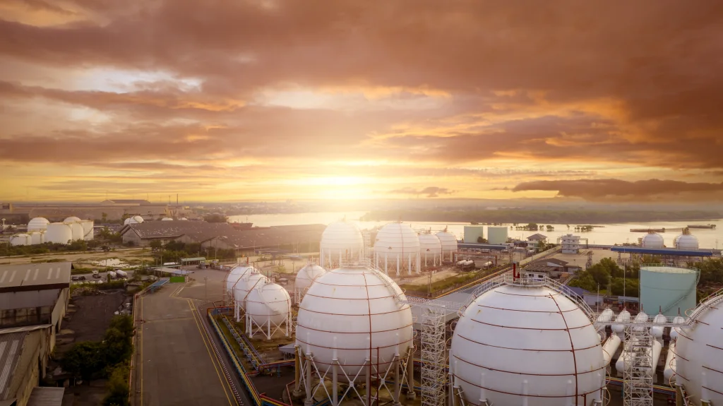 Industrial gas tanks in factories. LNG or liquefied gas storage. Global energy crisis. Energy crisis. Natural gas storage industry. Above-ground gas storage tank.
