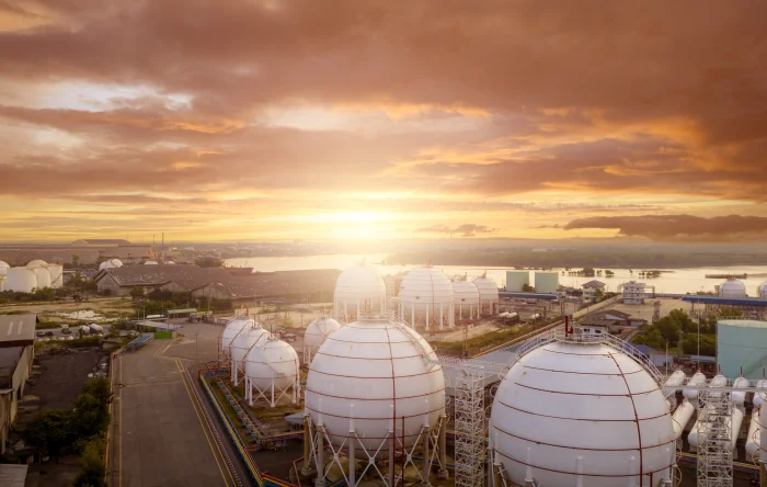 Industrial gas tanks in factories. LNG or liquefied gas storage. Global energy crisis. Energy crisis. Natural gas storage industry. Above-ground gas storage tank.